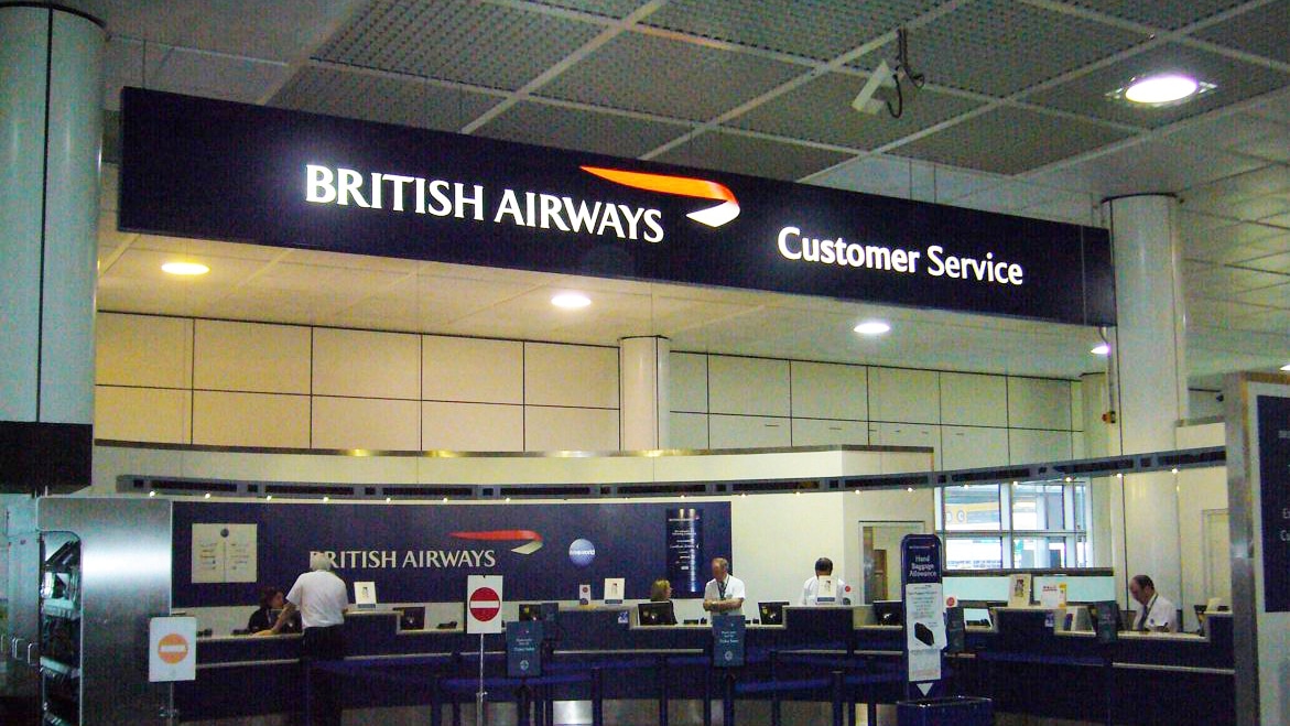 Lightbox signage for BA Customer service desk at Gatwick airport