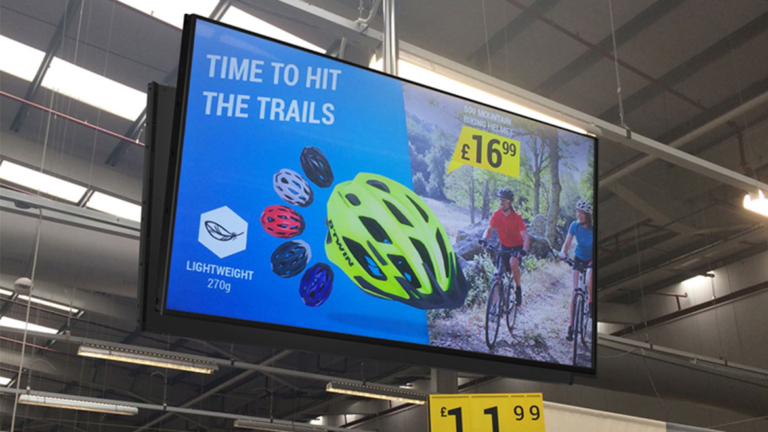 Budget digital signage screens hanging in store