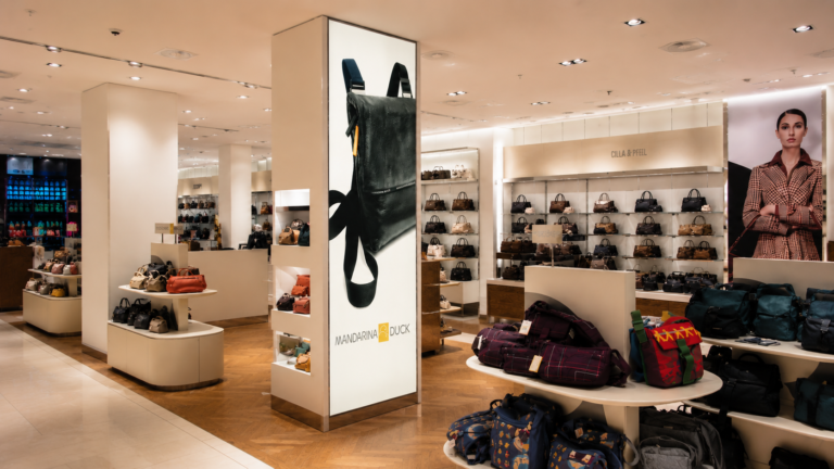 Atlas recessed lightbox with Luxury handbag graphic in retail store
