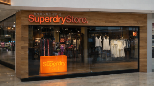 LED illuminated orange acrylic LED cube in Superdry Store window