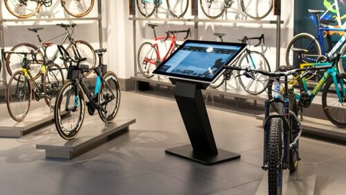 Interactive freestanding digital kiosk in bicycle shop