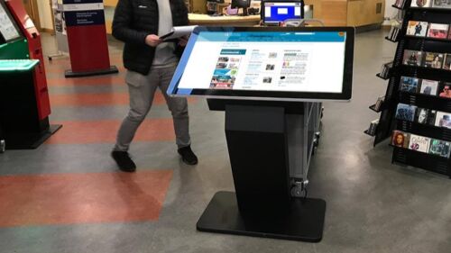 Library with a freestanding touchscreen kiosk