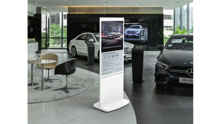 Vision Freestanding Digital Screen in a Car Showroom