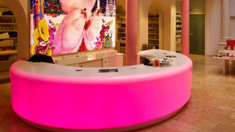 Flexible LED Light Sheet with RGB Colours Illuminating a Reception Desk