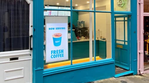 Double Sided Hanging Display in a Coffee Shop