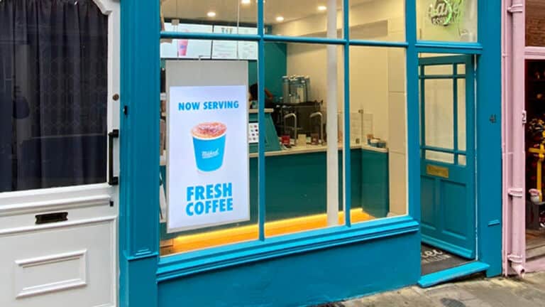 Double Sided Hanging Display in a Coffee Shop