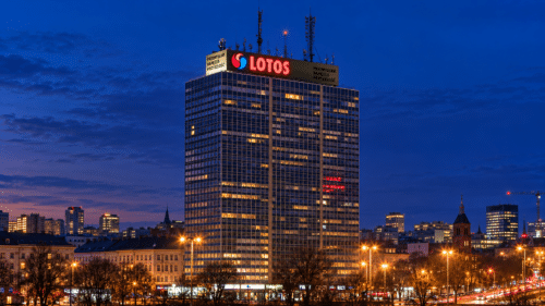 Large illuminated flex face letters and logo installed on city office tower
